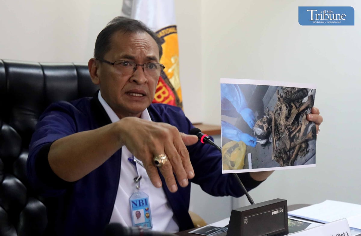 July 26 2024)……NBI Director Jaime Santiago shows a photo of abduction victim Gloria Razon Ortega during a press conference at the NBI Headquarters in Quezon City on Friday, July 26, 2024. On June 10, 2024, the two suspects allegedly abducted a woman and killed her son during a robbery in Barangay Baesa, Quezon City, and were apprehended as part of an NBI manhunt. The remains of the woman victim were identified using DNA testing and discovered in a ravine in Sta. Cruz, Bay, Laguna…….Photo/Analy Labor
